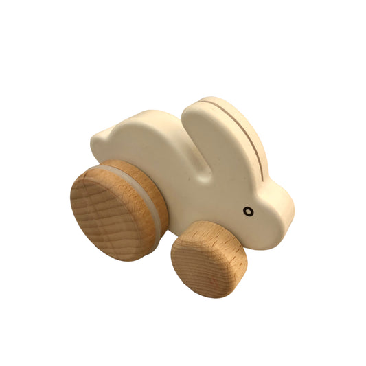 Small hopping wooden rabbit