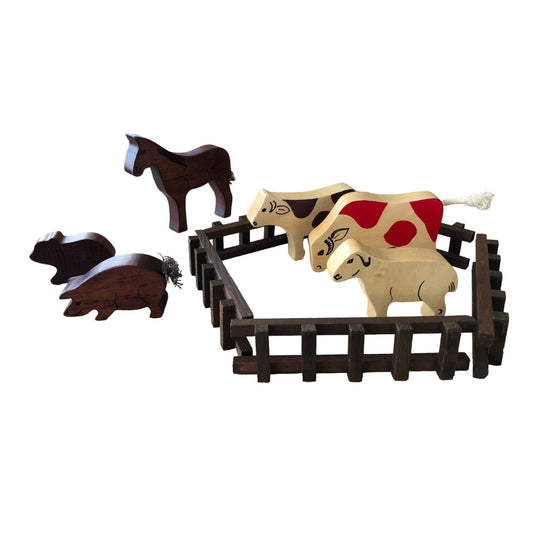 Wooden farm animals with fence